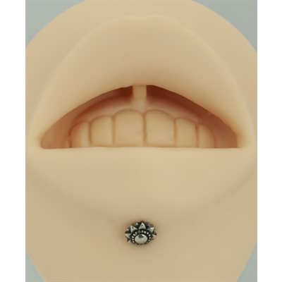 Internal labret with tribal attachment