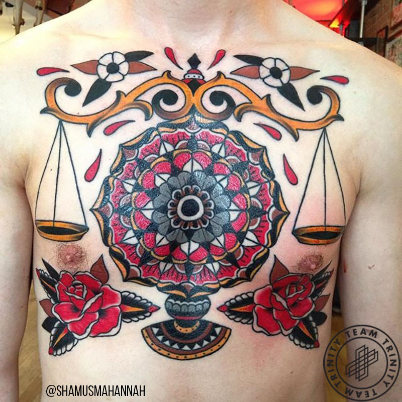 tattoo of scales on a chest